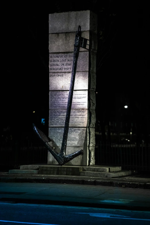 an art sculpture on a city street corner