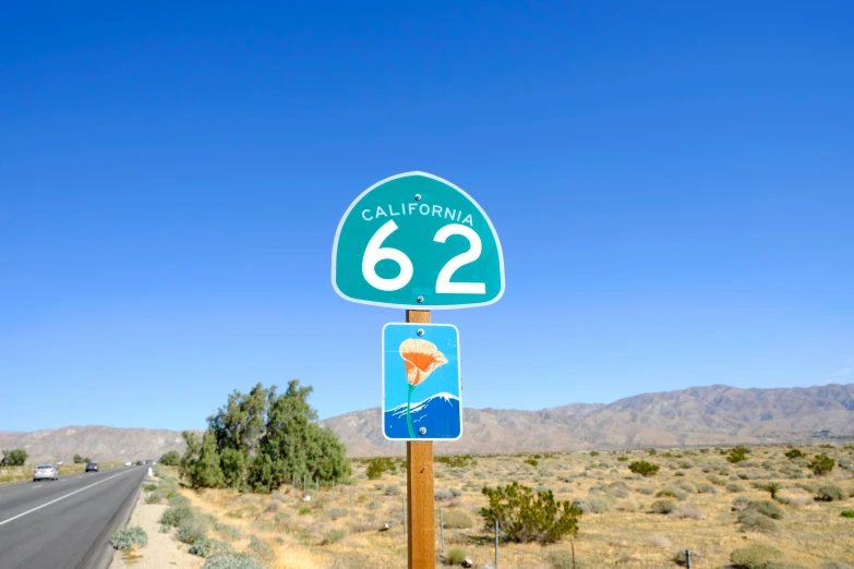 a street sign indicating the way to california highway
