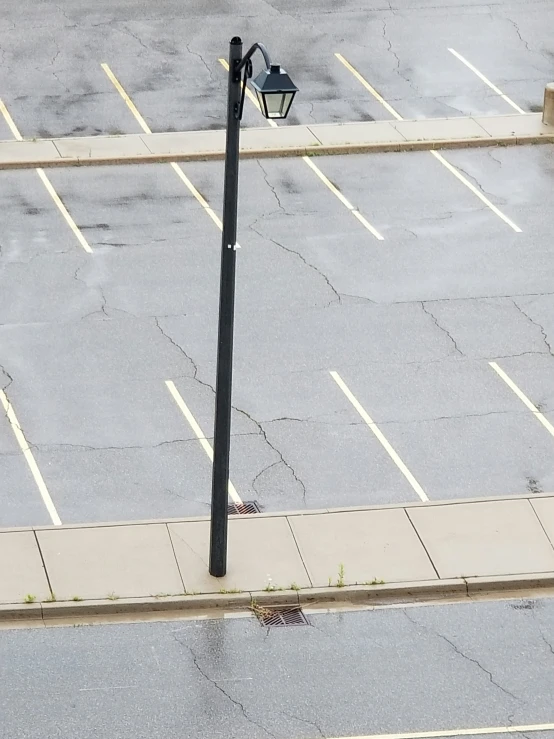 an empty parking lot is shown with no cars