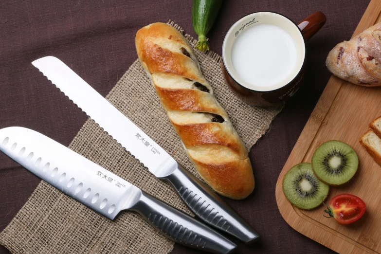 bread, pickles, and other foods laying on a cloth