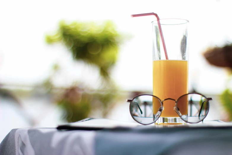 a drink and some glasses sitting on a table