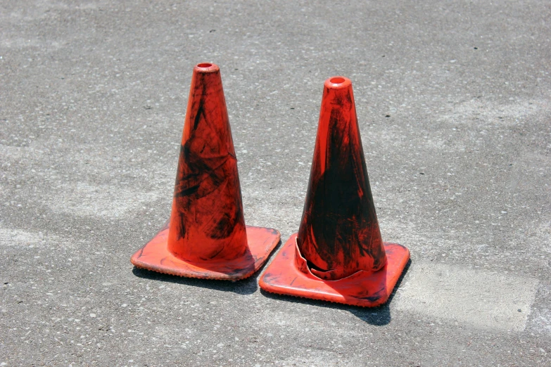 orange cones in the middle of a road