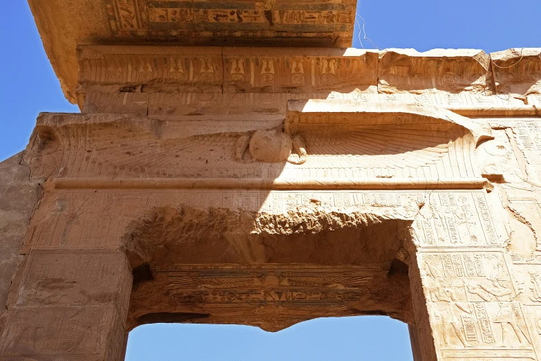 the ancient architecture of the temple has intricate carvings