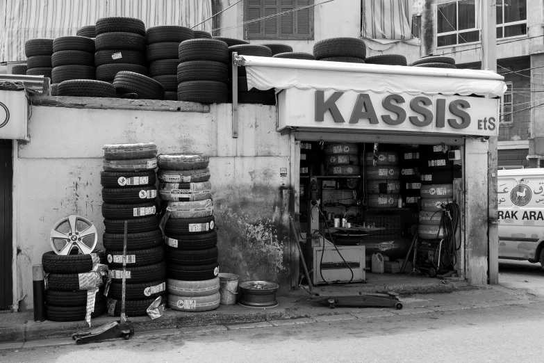 a building with a large pile of tires on the outside