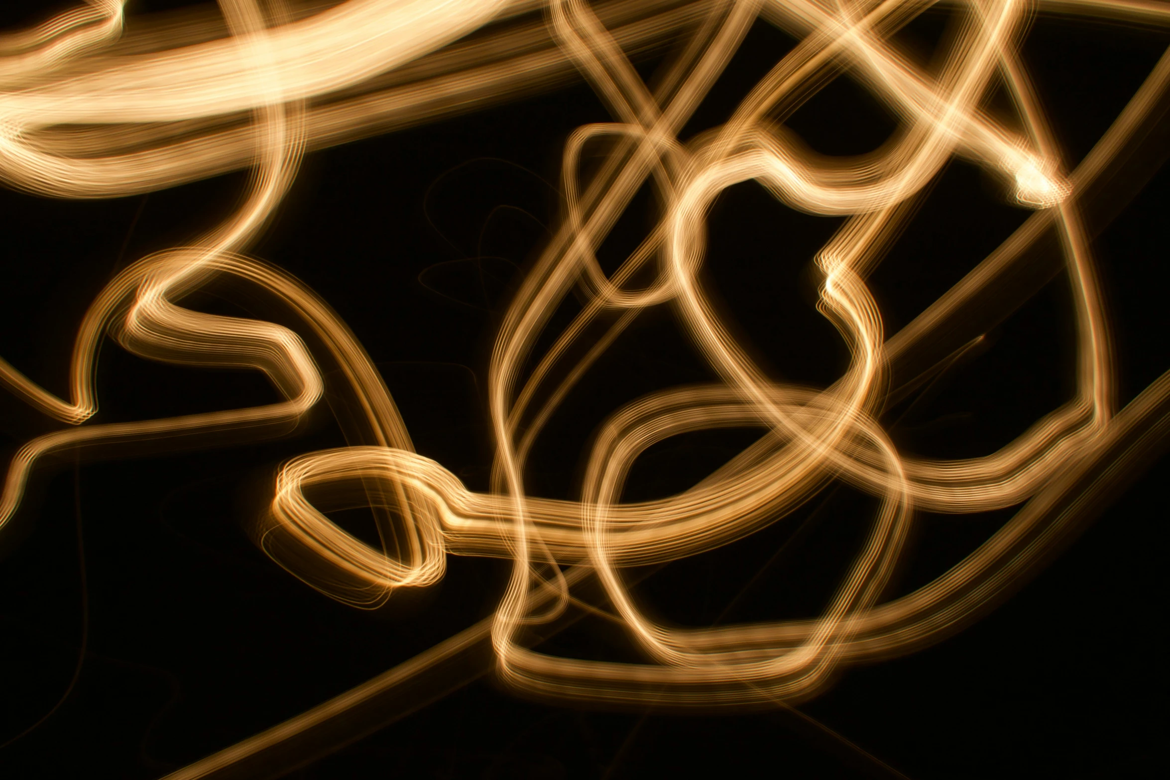 motion pograph of light streaks against black background