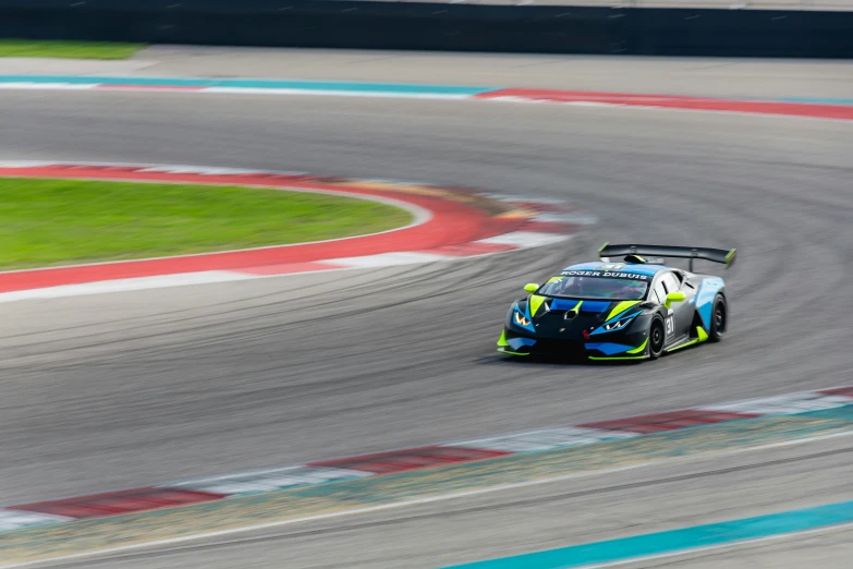 a race car going down a track on a racetrack