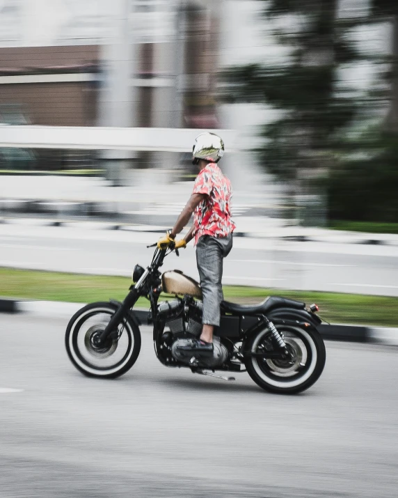 a person on a motor bike is in motion