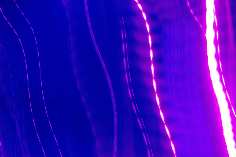 an image of blue and purple light streaks