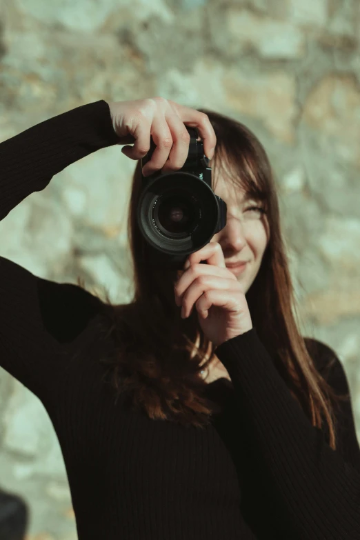 a girl takes a po with her camera