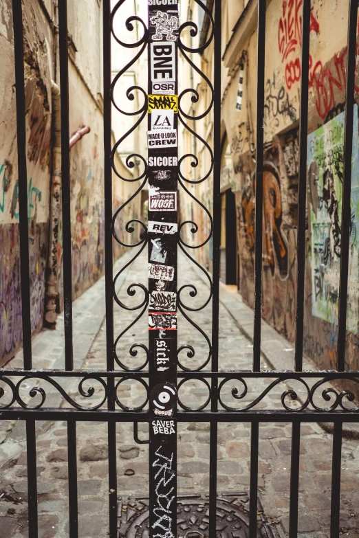 a pole with a bunch of signs posted on it