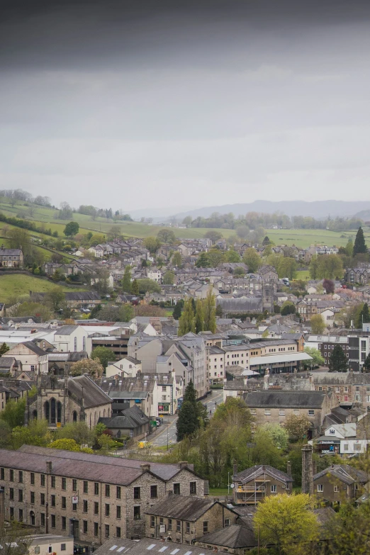 a view of a town from atop an old hill