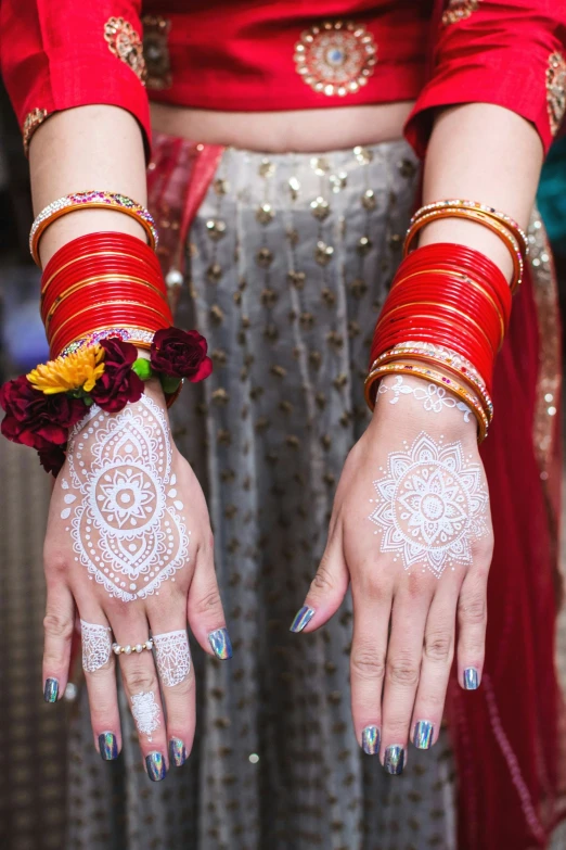 two hand decorated with white paint is pictured