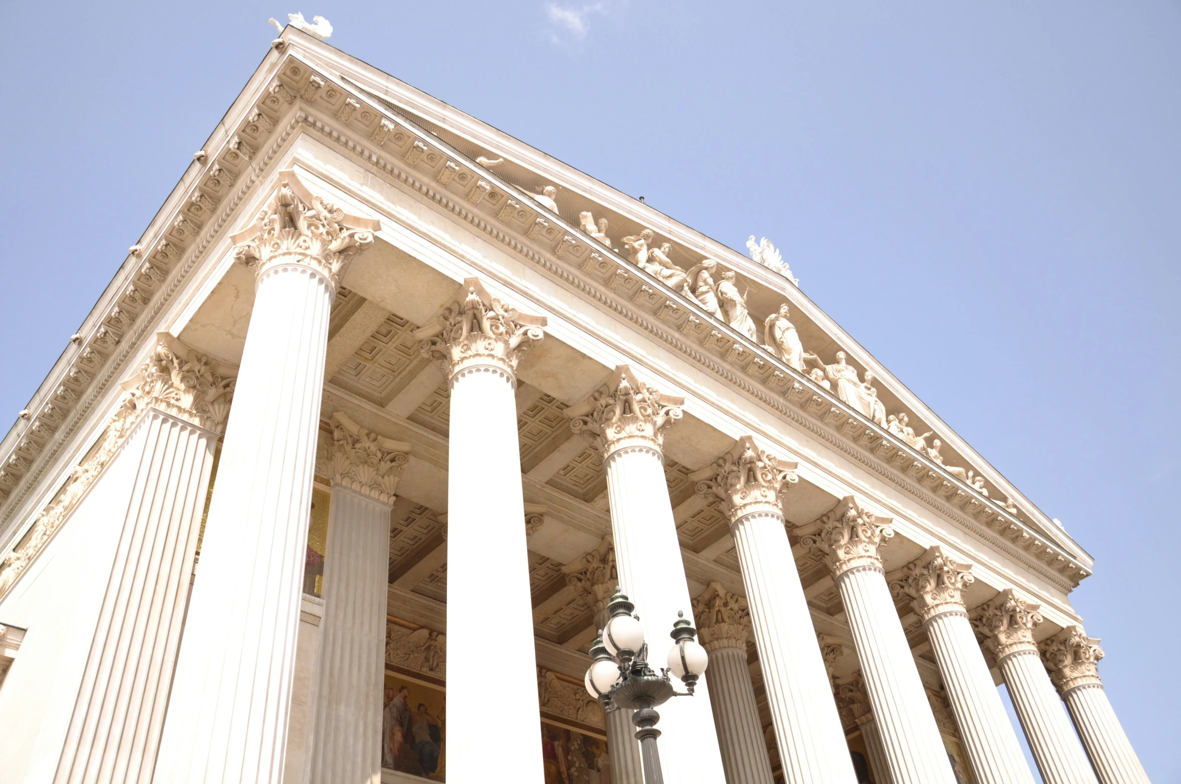 the columns and top of the building appear to be made of marble