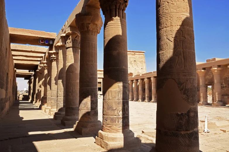columns in an old egyptian city on a sunny day