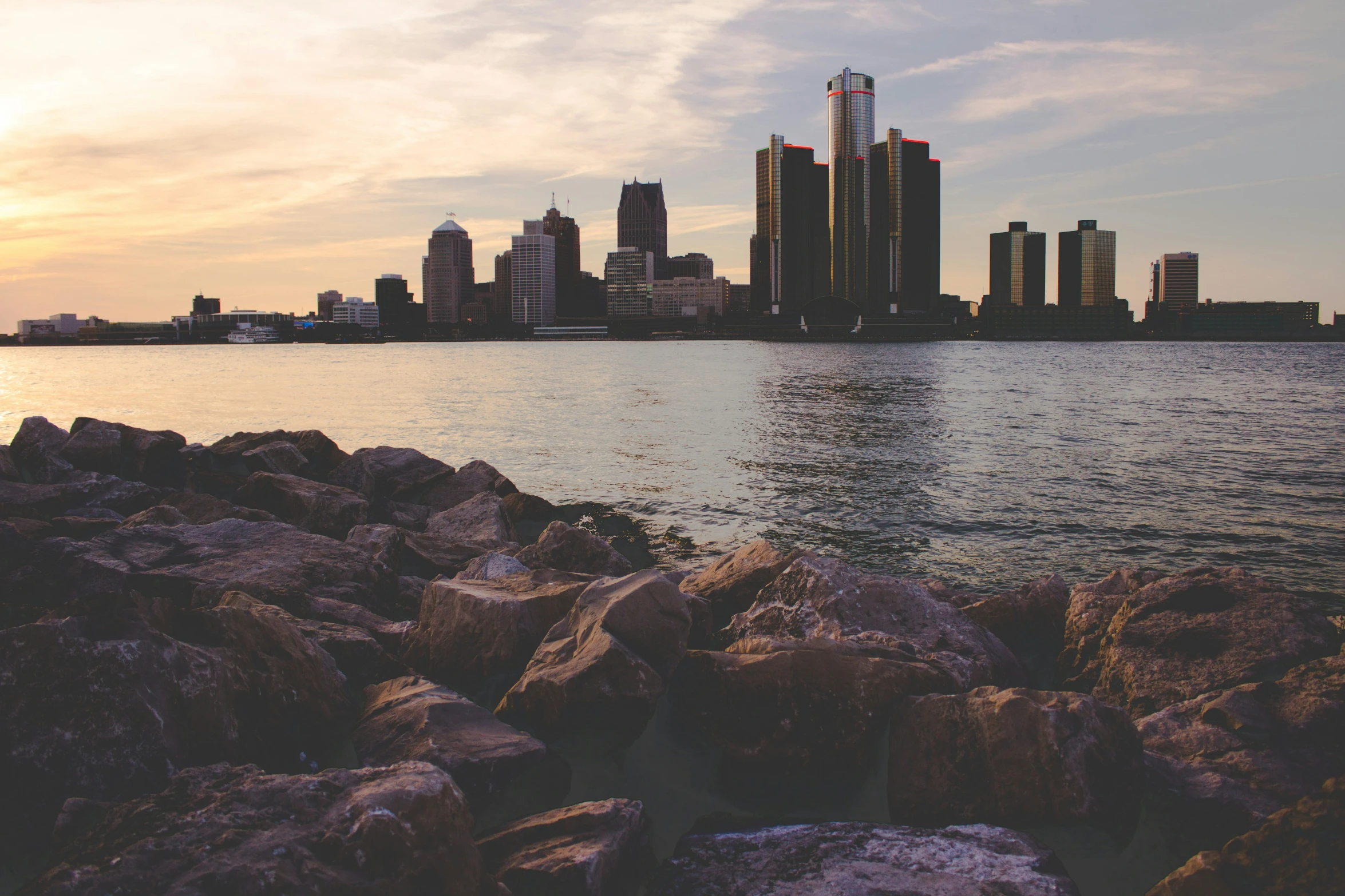 a view of the city of a large city over a large body of water