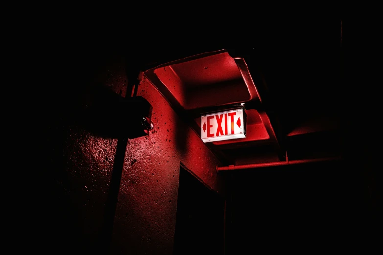 a red light shows a stop sign with the word exit on it