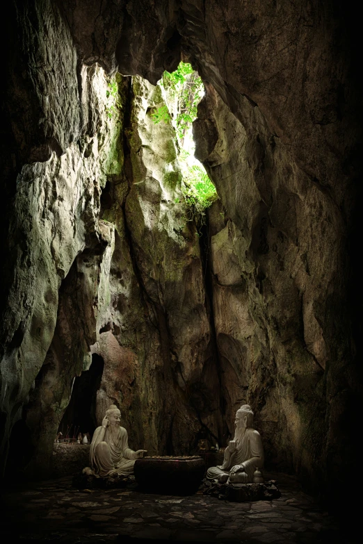 the light in a cave reveals bright green and white colors