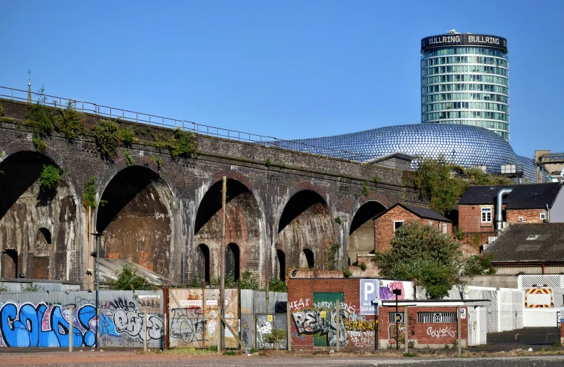 a long view of a building with a tower