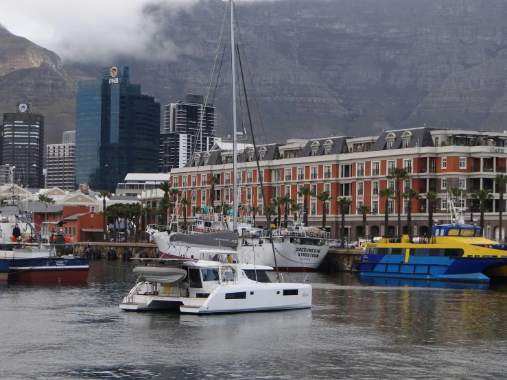 there is a boat in the harbor and the other boats are in it