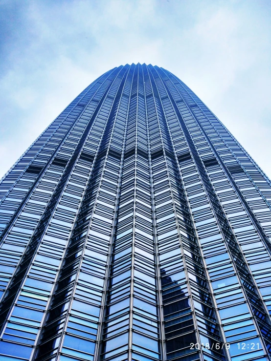 a very tall building that has a sky in the background