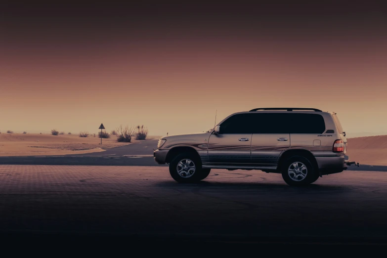 a picture of a suv parked on the side of a road