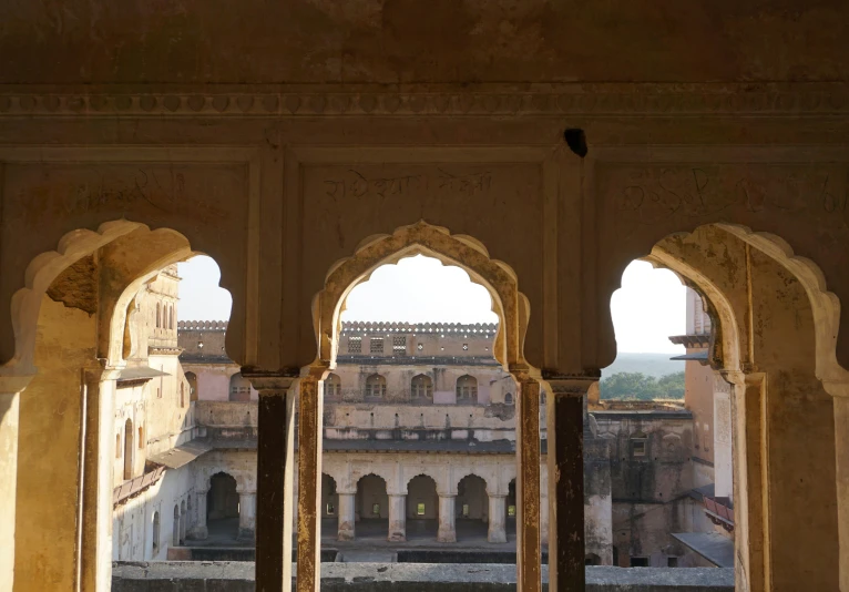 a building has multiple arches and small balconies