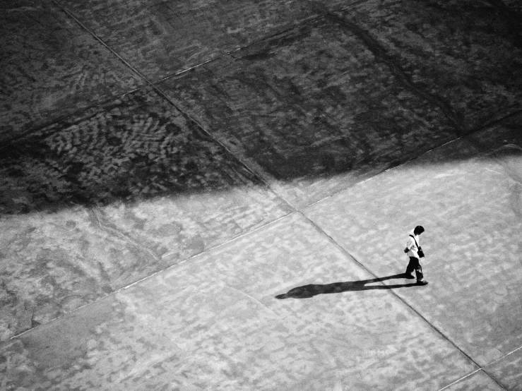 a person walking on the beach and having fun