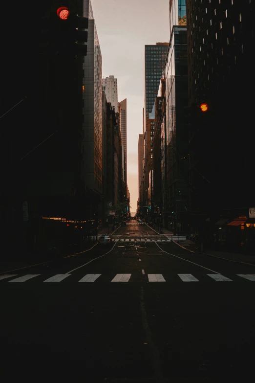 a city street with skyscrs in the distance