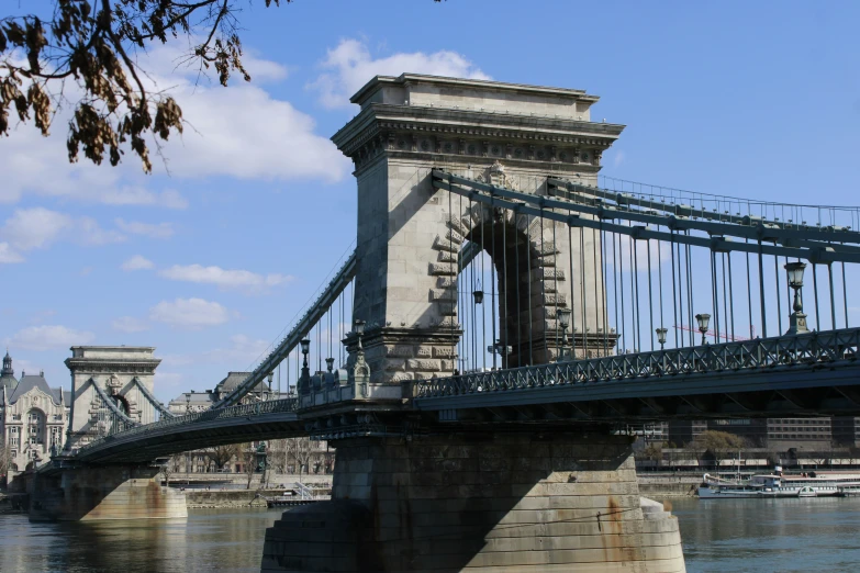 a bridge that is very tall and has some lights on it