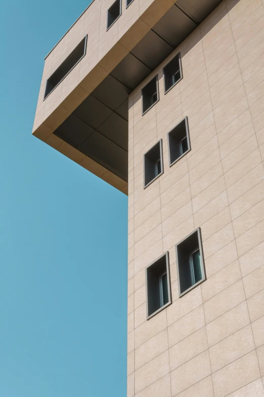 an image of a clock on the side of a building