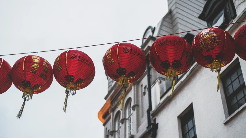 red paper lanterns strung up over the city