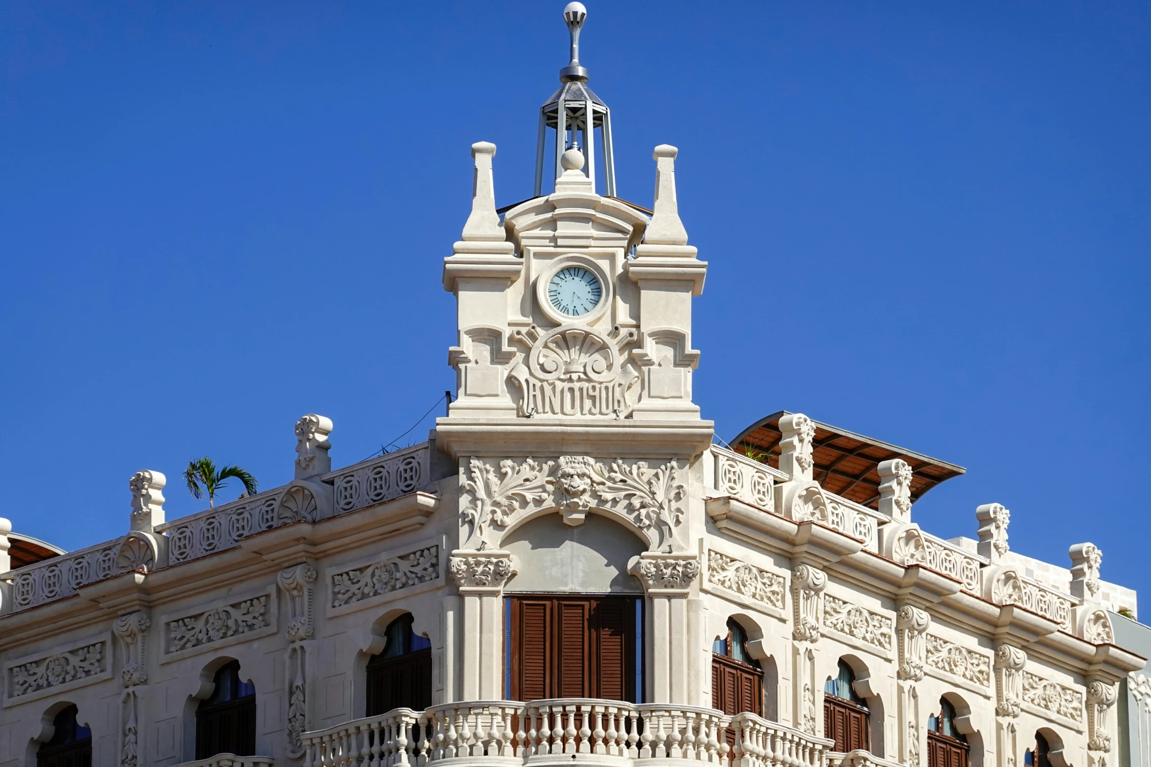 a clock is on the top of a building