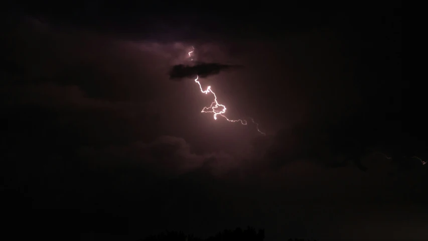 there are lightning coming out of the clouds