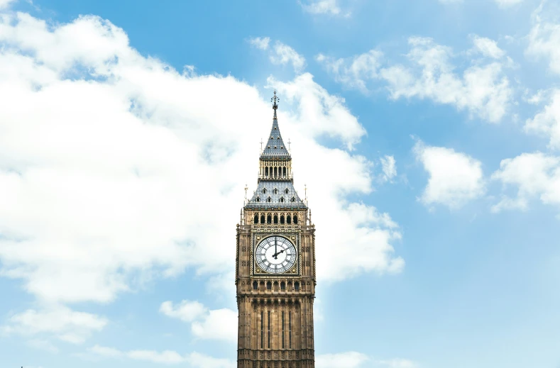 a large clock tower towering above a city