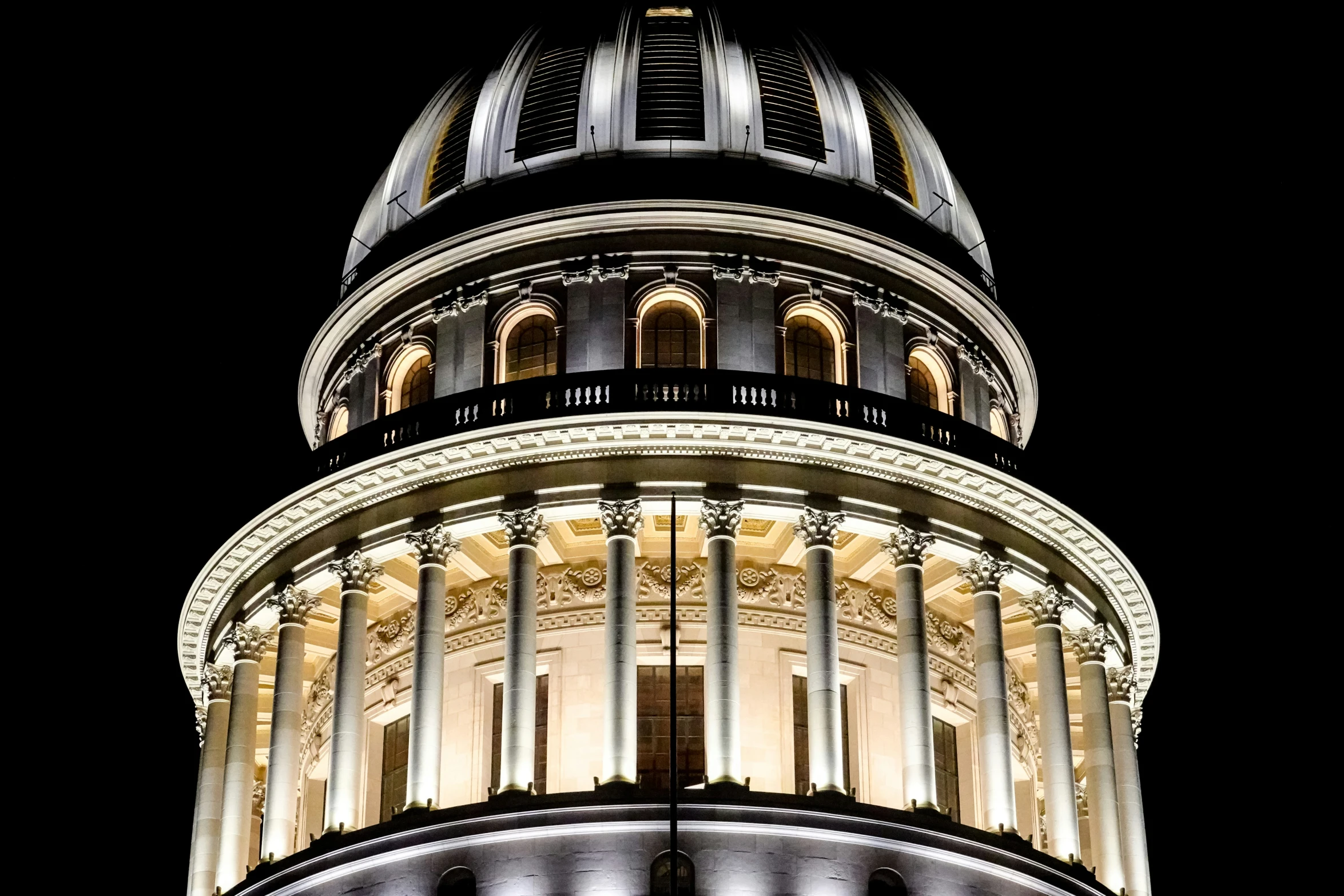 a tall tower that is lit up at night