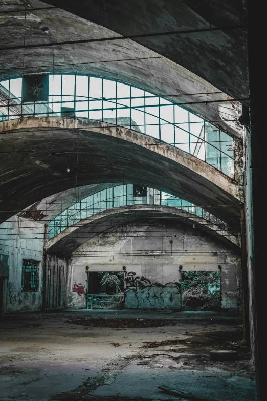 an abandoned building with windows that looks like it is under construction