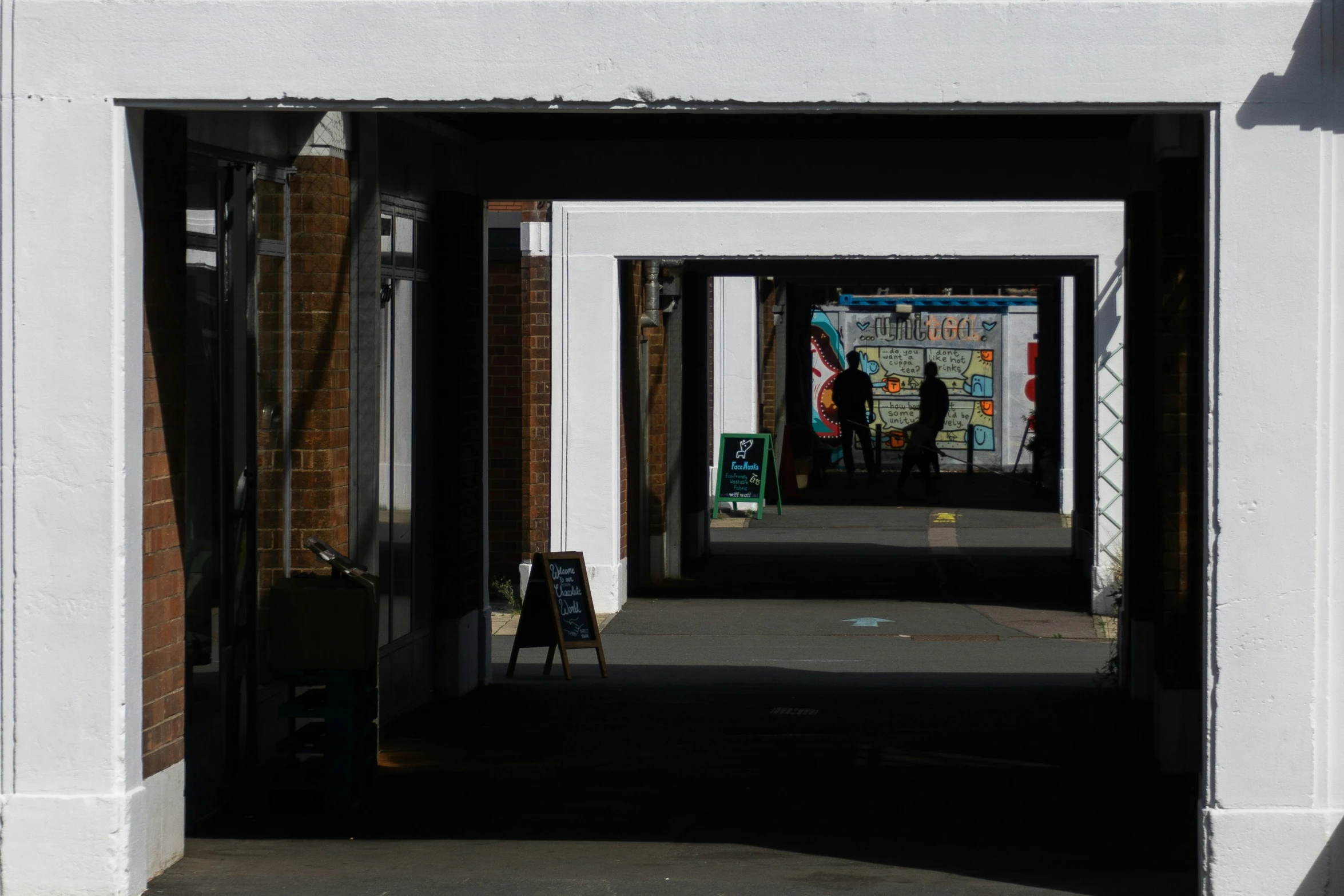 an open doorway is shown with some signs on the outside