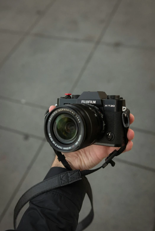 person holding up camera and taking a picture