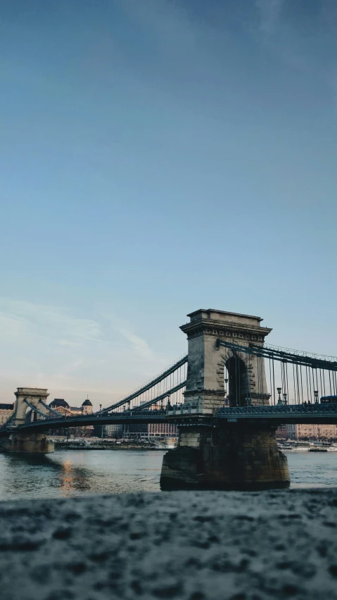 a river flows through the city and a bridge