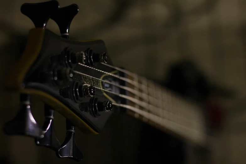 an image of a ukulele guitar in the dark