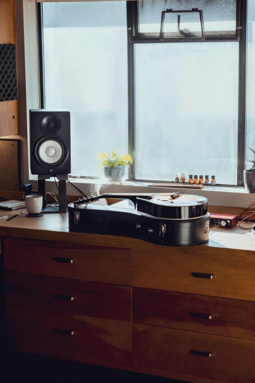 a kitchen counter with many tools and items on it