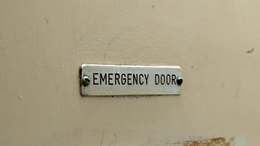 a sign is on the door of an office building