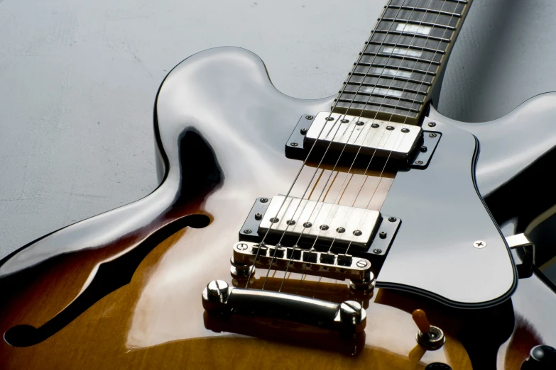 a guitar sitting on top of a table