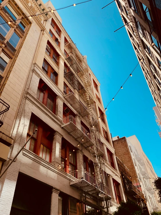 some old buildings have balconies on each floor