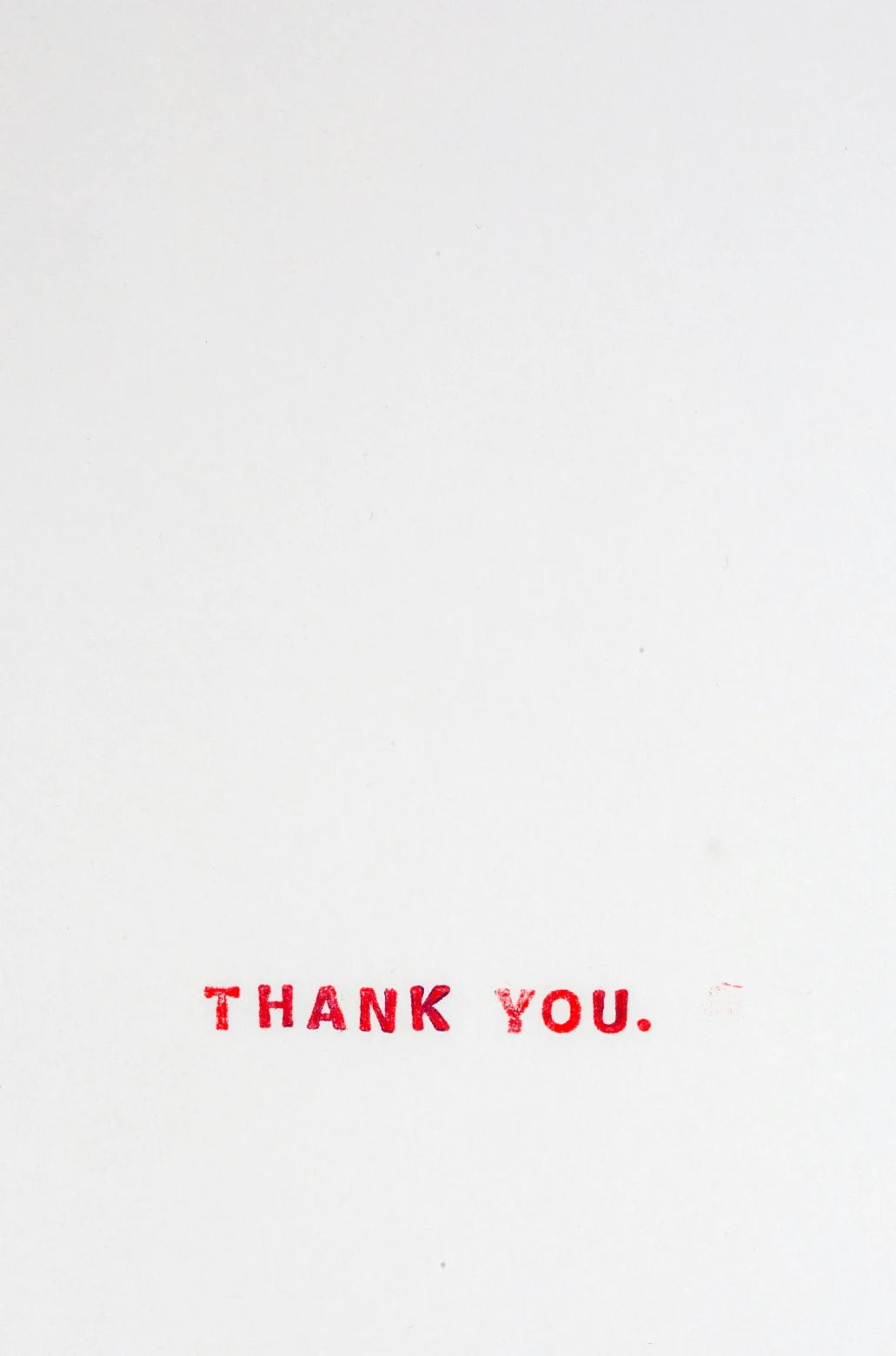 a red and white sign with words thank you written on it