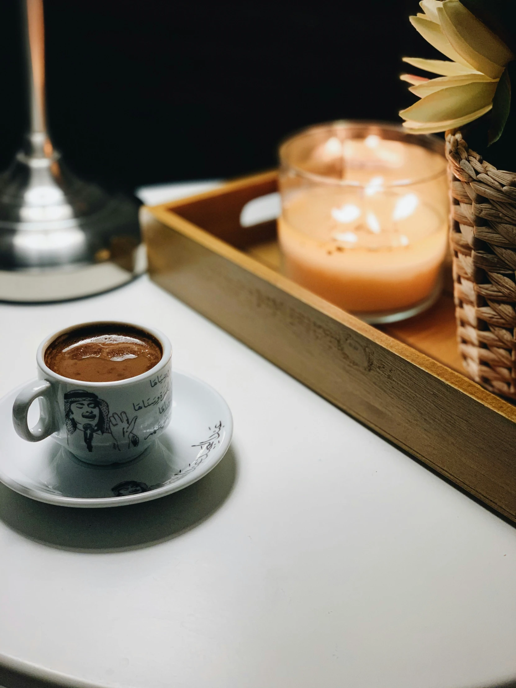 a cup of  chocolate sitting on a saucer