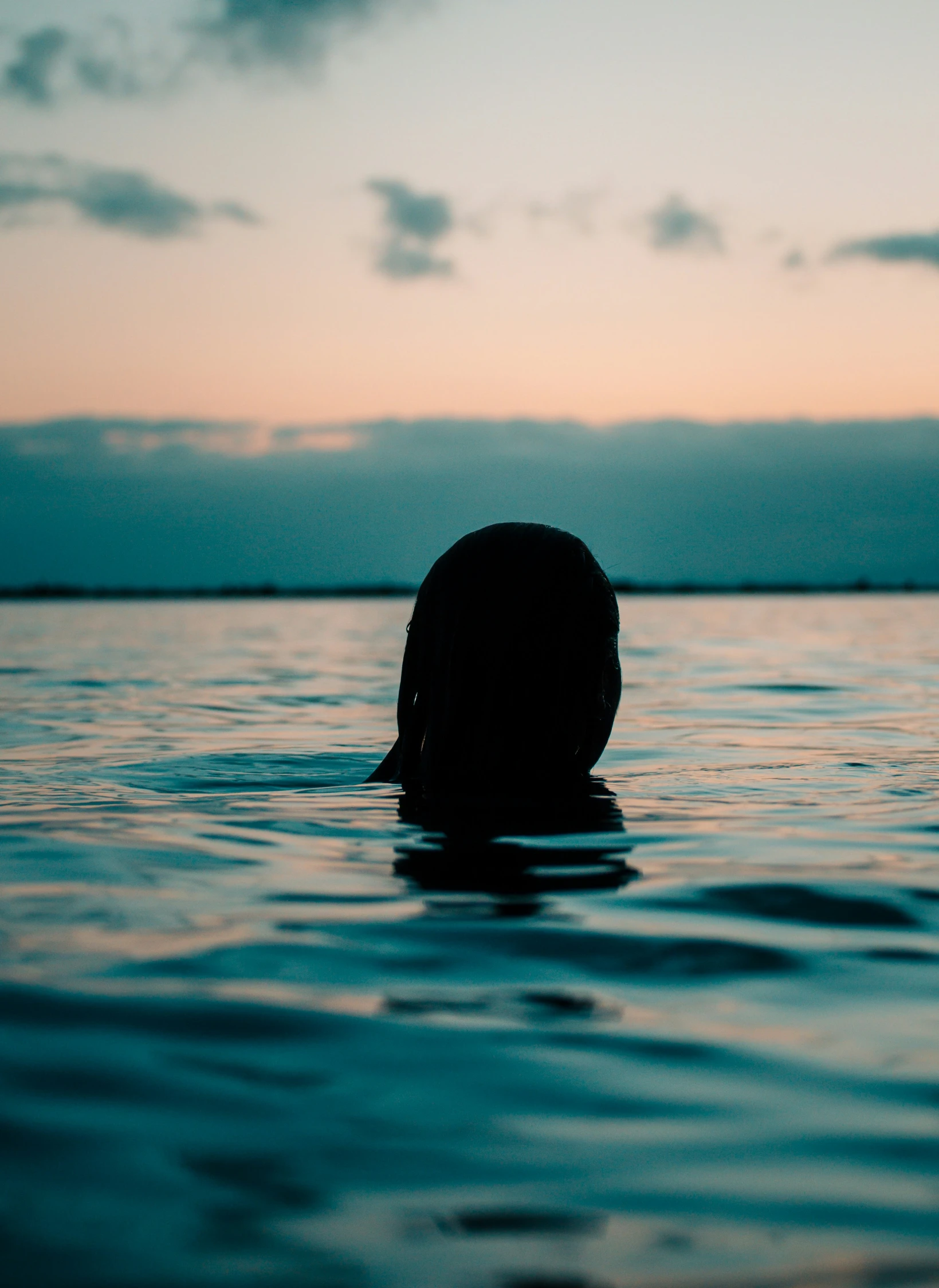 a person in the water in a body of water