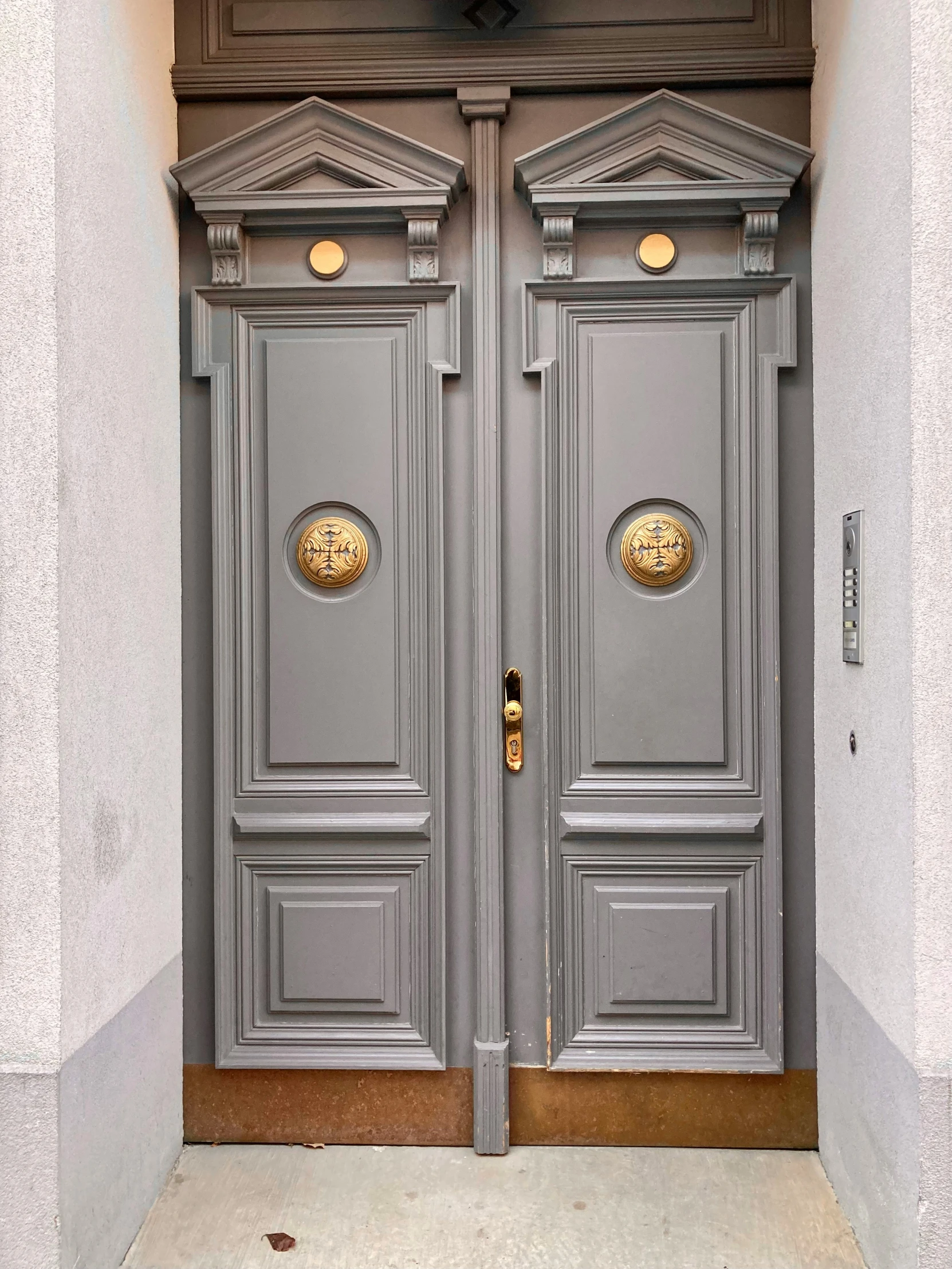 the doors are designed in art nouveau and decorative