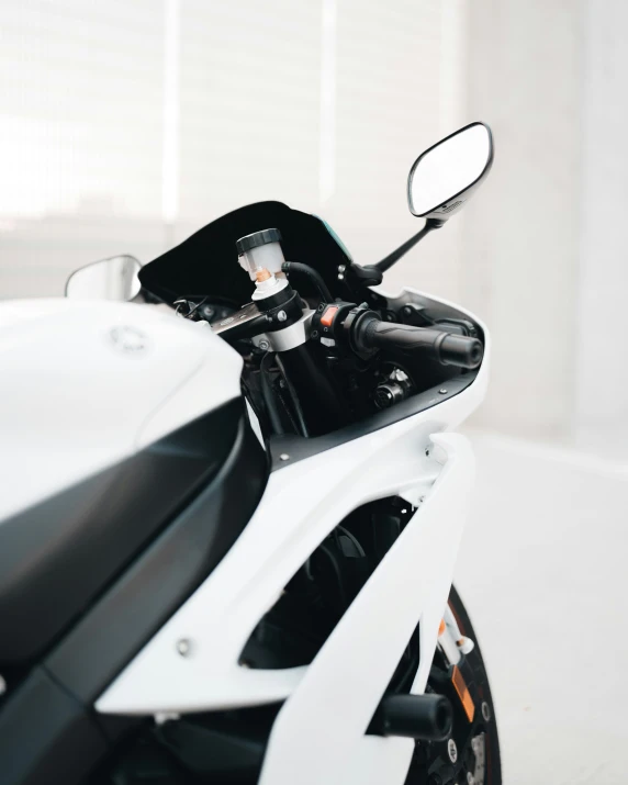 a closeup view of the rear seat on a motor bike