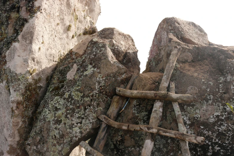 rock climbers are climbing up and down the rocks